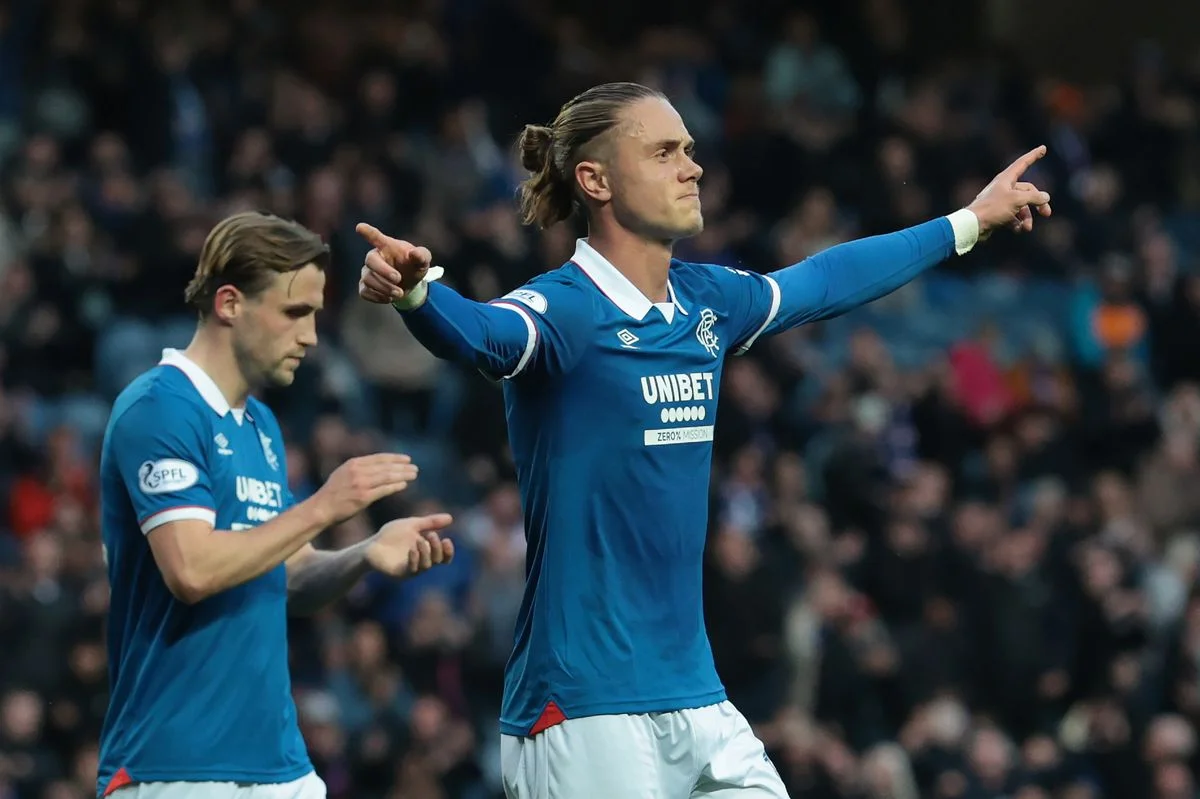 Thelo Aasgaard of Rangers celebrates scoring his teams first goal during the William Hill Premiership match between Rangers and Hibernian at Ibrox Stadium