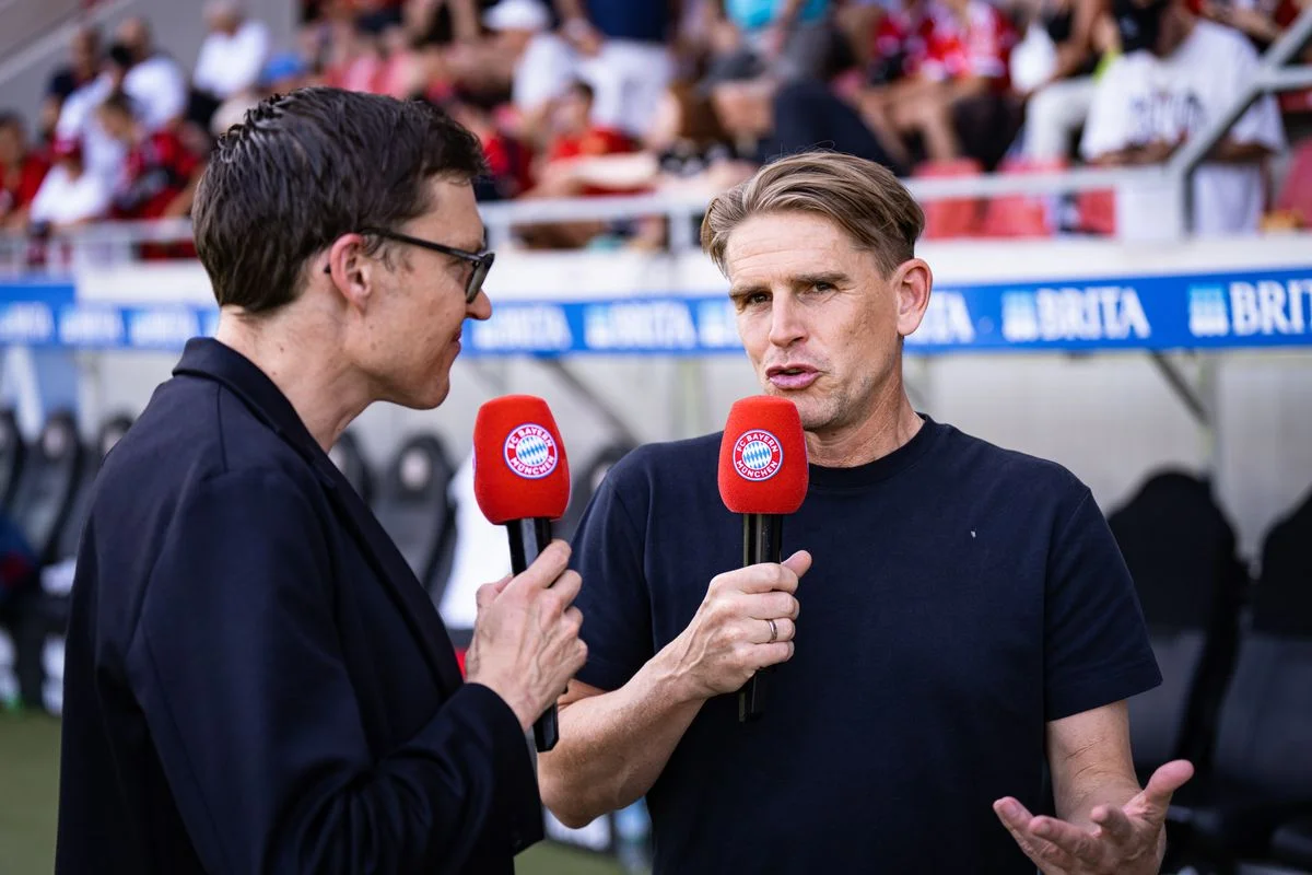 WIESBADEN, GERMANY - JULY 25: (EDITORS NOTE: Image has been digitally enhanced.) Christoph Freund, sports director of FC Bayern Muenchen, is speaking in the interview during the pre-season friendly match between SV Wehen Wiesbaden and FC Bayern München at BRITA-Arena on July 25, 2026 in Wiesbaden, Germany. (Photo by S. Stingl/FC Bayern via Getty Images)